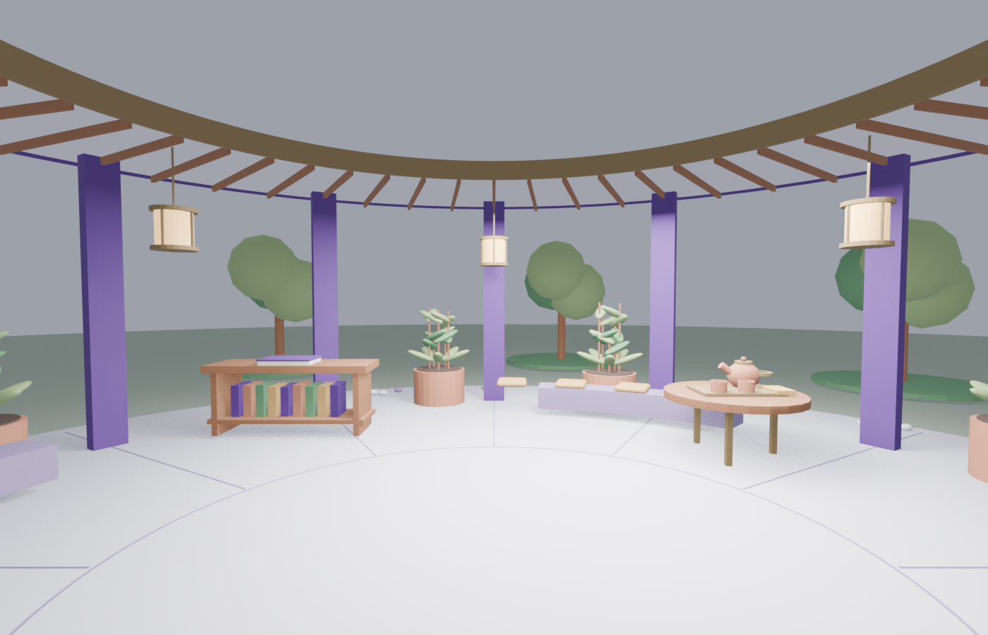 Inside Living Pavilion: hanging lanterns, a book console and a tea table beneath a circular timber canopy, surrounded by trees